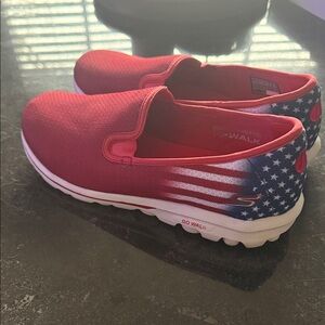Skechers women’s Go Walk classic slip-on sneakers, featuring RW&B American flag